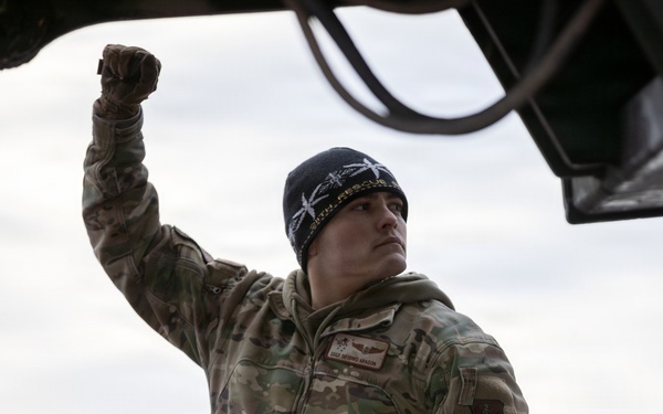 176th Wing air transportation specialists and loadmasters work together
