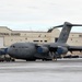 176th Wing air transportation specialists and loadmasters work together