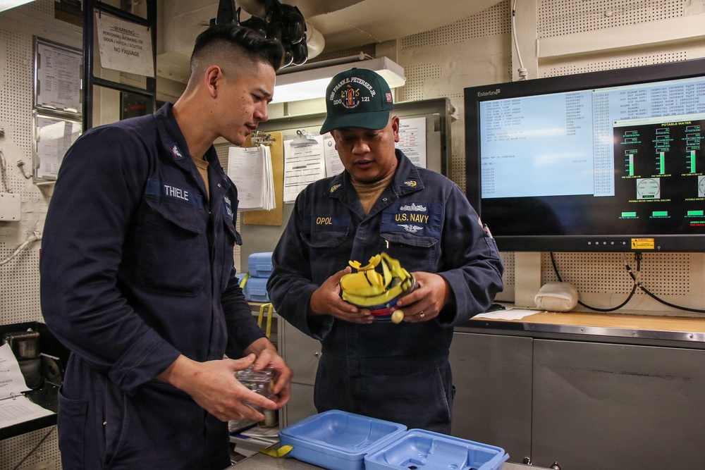 Frank E. Petersen Jr. conducts routine operations