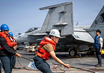 Abraham Lincoln conducts a replenishment-at-sea with Carl Brashear