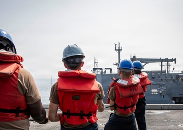 Abraham Lincoln conducts a replenishment-at-sea with Carl Brashear