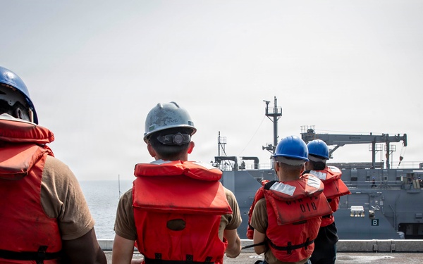 Abraham Lincoln conducts a replenishment-at-sea with Carl Brashear