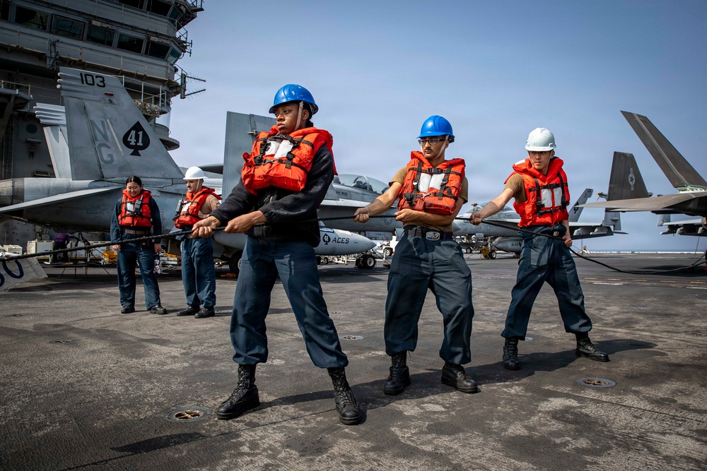 Abraham Lincoln conducts a replenishment-at-sea with Carl Brashear