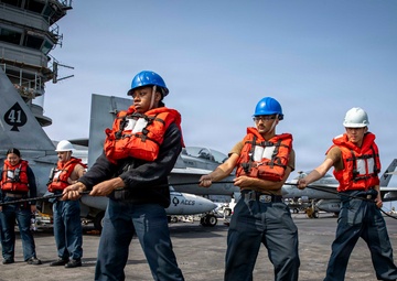 Abraham Lincoln conducts a replenishment-at-sea with Carl Brashear