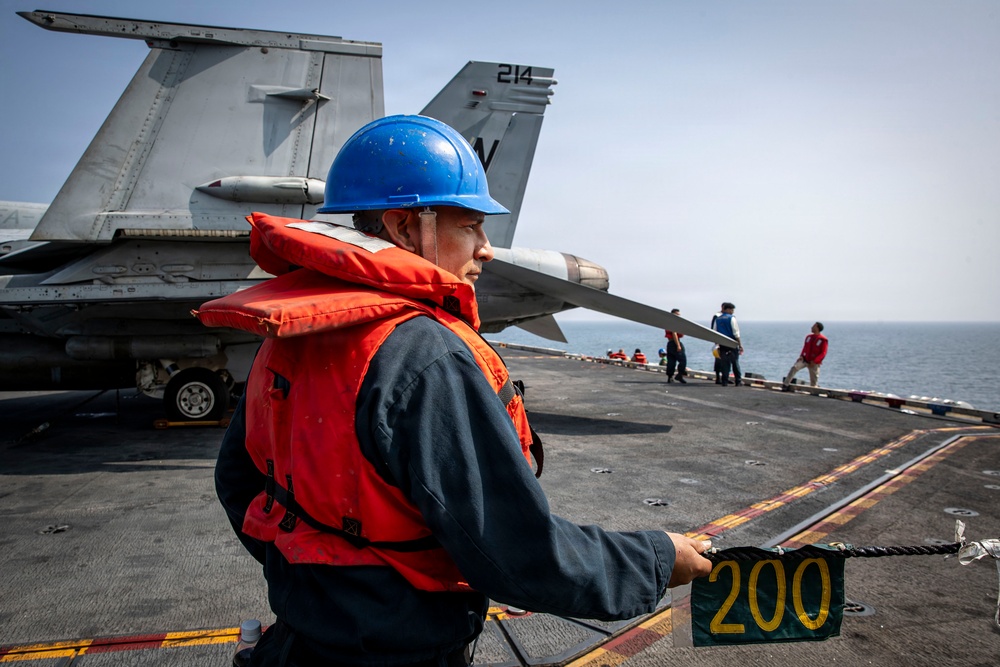 Abraham Lincoln conducts a replenishment-at-sea with Carl Brashear