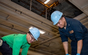 Abraham Lincoln Conducts Routine Maintenance