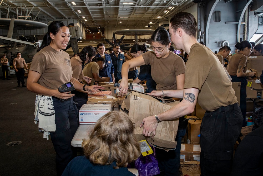 Abraham Lincoln Sorts Mail During a Replenishment-At-Sea with Carl Brashear