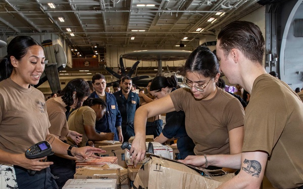 Abraham Lincoln Sorts Mail During a Replenishment-At-Sea with Carl Brashear