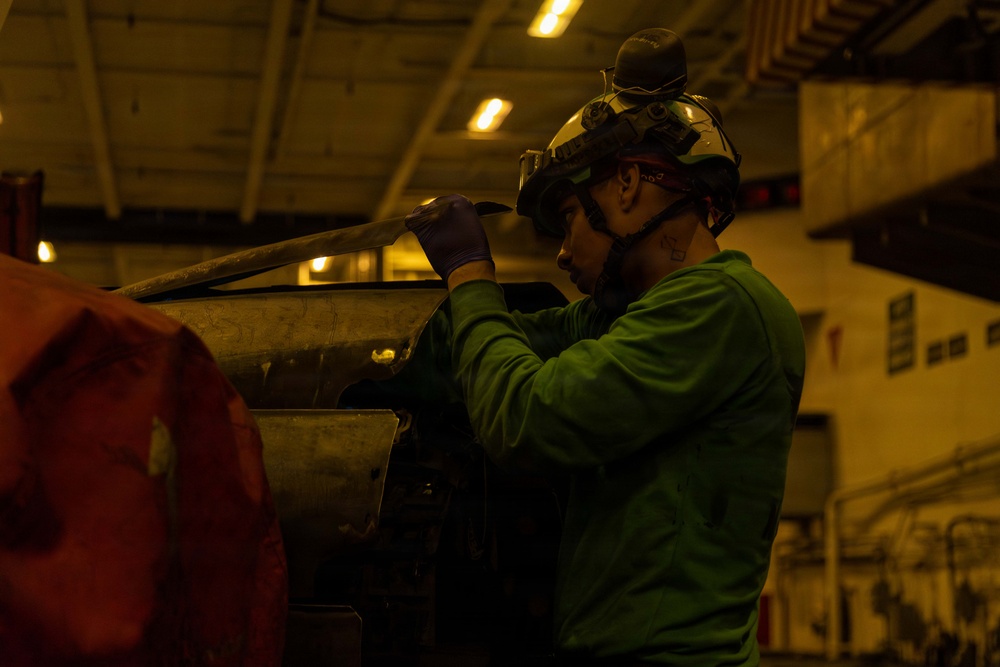 Abraham Lincoln Conducts Routine Aircraft Maintenance