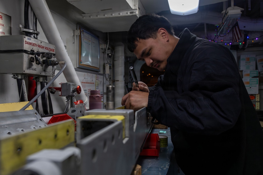 Abraham Lincoln Conducts Routine Aircraft Maintenance