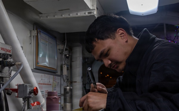 Abraham Lincoln Conducts Routine Aircraft Maintenance