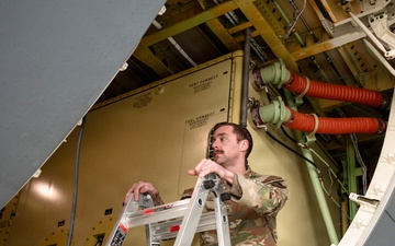 Crew Chief inspect KC-46A Pegasus aircraft