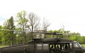 Photo Story: Soldiers with 13th Battalion, 100th Regiment hold slingload training at McCoy; Wisconsin National Guard Black Hawks, crews assist