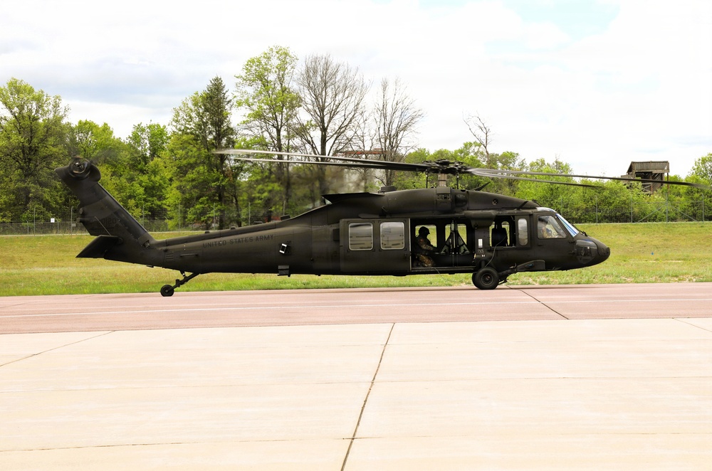 Soldiers with 13th Battalion, 100th Regiment hold slingload training at McCoy; Wisconsin National Guard Black Hawks, crews assist