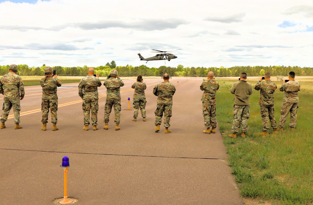 Soldiers with 13th Battalion, 100th Regiment hold slingload training at McCoy; Wisconsin National Guard Black Hawks, crews assist