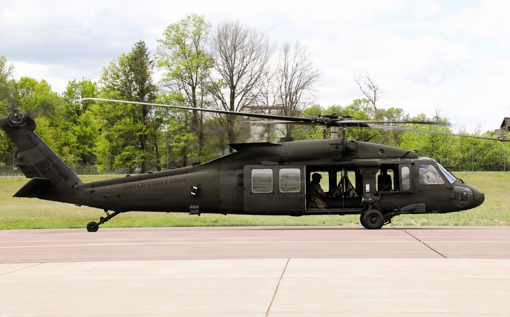 Soldiers with 13th Battalion, 100th Regiment hold slingload training at McCoy; Wisconsin National Guard Black Hawks, crews assist