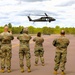 Soldiers with 13th Battalion, 100th Regiment hold slingload training at McCoy; Wisconsin National Guard Black Hawks, crews assist