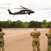 Soldiers with 13th Battalion, 100th Regiment hold slingload training at McCoy; Wisconsin National Guard Black Hawks, crews assist