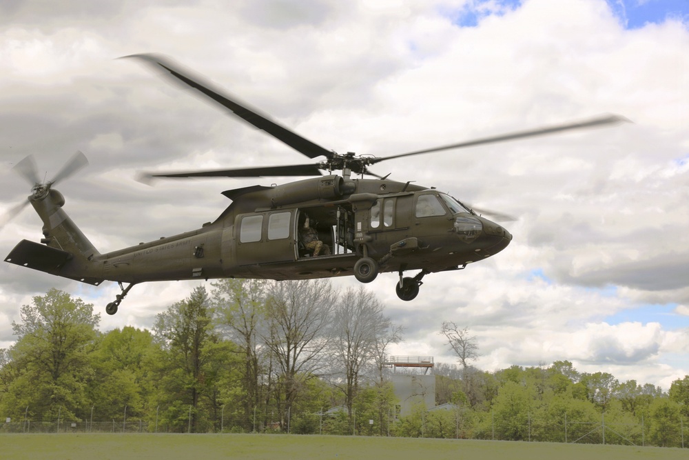 Soldiers with 13th Battalion, 100th Regiment hold slingload training at McCoy; Wisconsin National Guard Black Hawks, crews assist