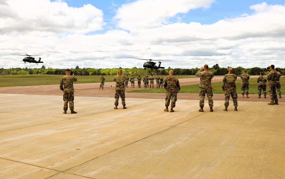 Soldiers with 13th Battalion, 100th Regiment hold slingload training at McCoy; Wisconsin National Guard Black Hawks, crews assist