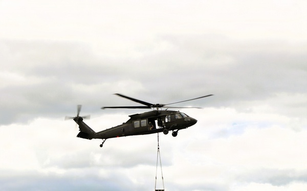 Soldiers with 13th Battalion, 100th Regiment hold slingload training at McCoy; Wisconsin National Guard Black Hawks, crews assist