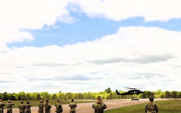 Soldiers with 13th Battalion, 100th Regiment hold slingload training at McCoy; Wisconsin National Guard Black Hawks, crews assist