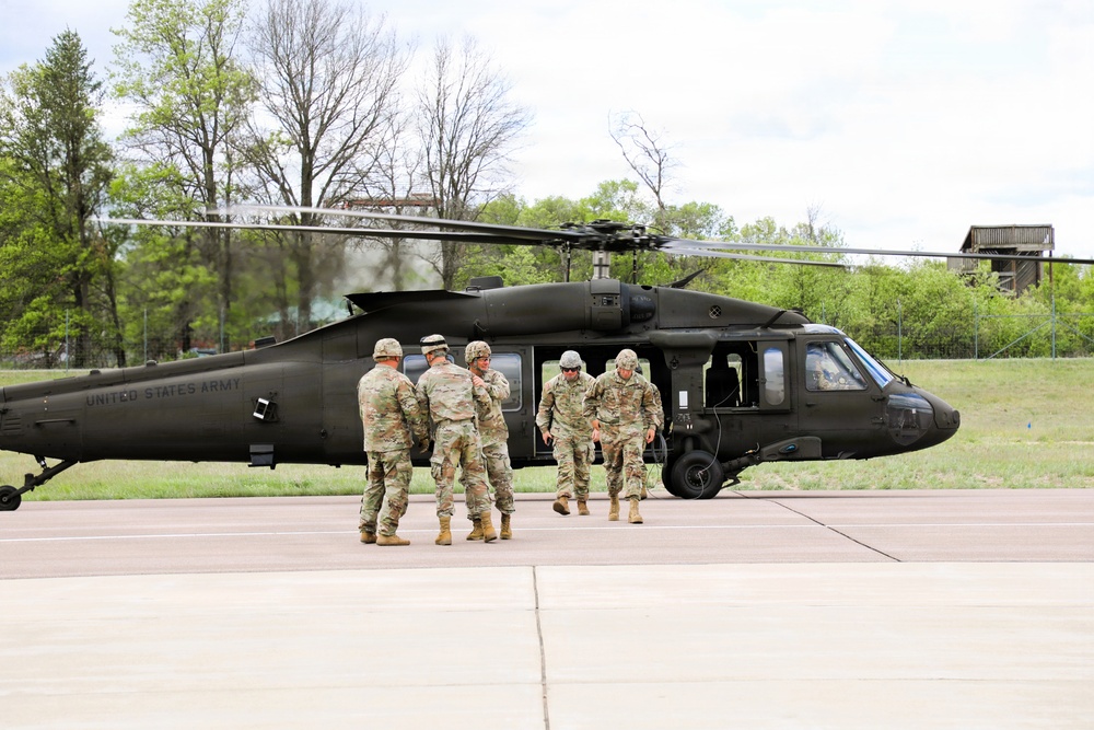 Soldiers with 13th Battalion, 100th Regiment hold slingload training at McCoy; Wisconsin National Guard Black Hawks, crews assist