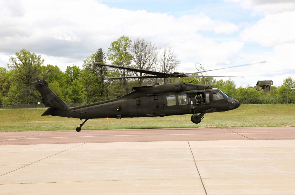 Soldiers with 13th Battalion, 100th Regiment hold slingload training at McCoy; Wisconsin National Guard Black Hawks, crews assist