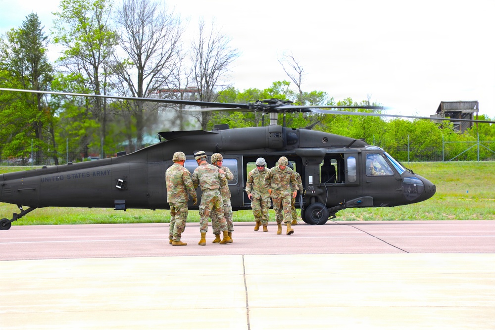 Soldiers with 13th Battalion, 100th Regiment hold slingload training at McCoy; Wisconsin National Guard Black Hawks, crews assist