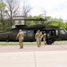 Soldiers with 13th Battalion, 100th Regiment hold slingload training at McCoy; Wisconsin National Guard Black Hawks, crews assist