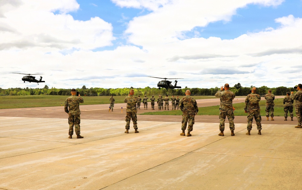 Soldiers with 13th Battalion, 100th Regiment hold slingload training at McCoy; Wisconsin National Guard Black Hawks, crews assist