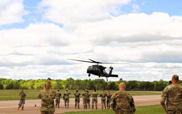 Soldiers with 13th Battalion, 100th Regiment hold slingload training at McCoy; Wisconsin National Guard Black Hawks, crews assist