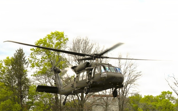 Soldiers with 13th Battalion, 100th Regiment hold slingload training at McCoy; Wisconsin National Guard Black Hawks, crews assist