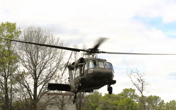 Soldiers with 13th Battalion, 100th Regiment hold slingload training at McCoy; Wisconsin National Guard Black Hawks, crews assist