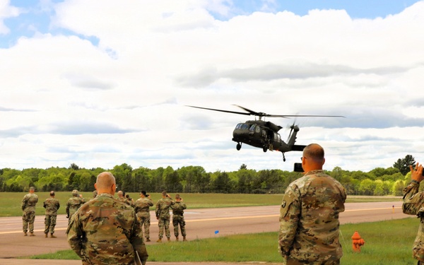 Soldiers with 13th Battalion, 100th Regiment hold slingload training at McCoy; Wisconsin National Guard Black Hawks, crews assist