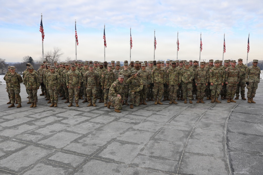 Secretary of War Pete Hegseth officiates the oath of enlistment to a formation of National Guard Soldiers