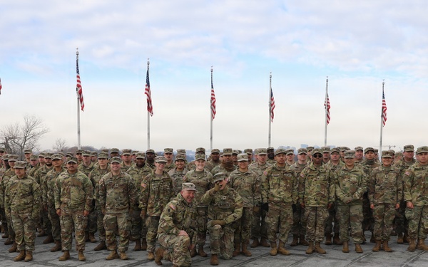 Secretary of War Pete Hegseth officiates the oath of enlistment to a formation of National Guard Soldiers