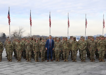 Secretary of War Pete Hegseth officiates the oath of enlistment to a formation of National Guard Soldiers