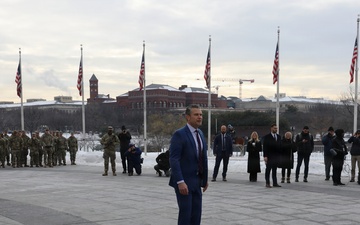 Secretary of War Pete Hegseth officiates the oath of enlistment to a formation of National Guard Soldiers