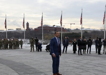 Secretary of War Pete Hegseth officiates the oath of enlistment to a formation of National Guard Soldiers