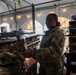 Mississippi Army National Guard Soldiers receive weapons before patrol in Washington, D.C.