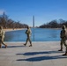Mississippi Army National Guard Soldiers patrol in front of the Lincoln Memorial Reflecting Pool