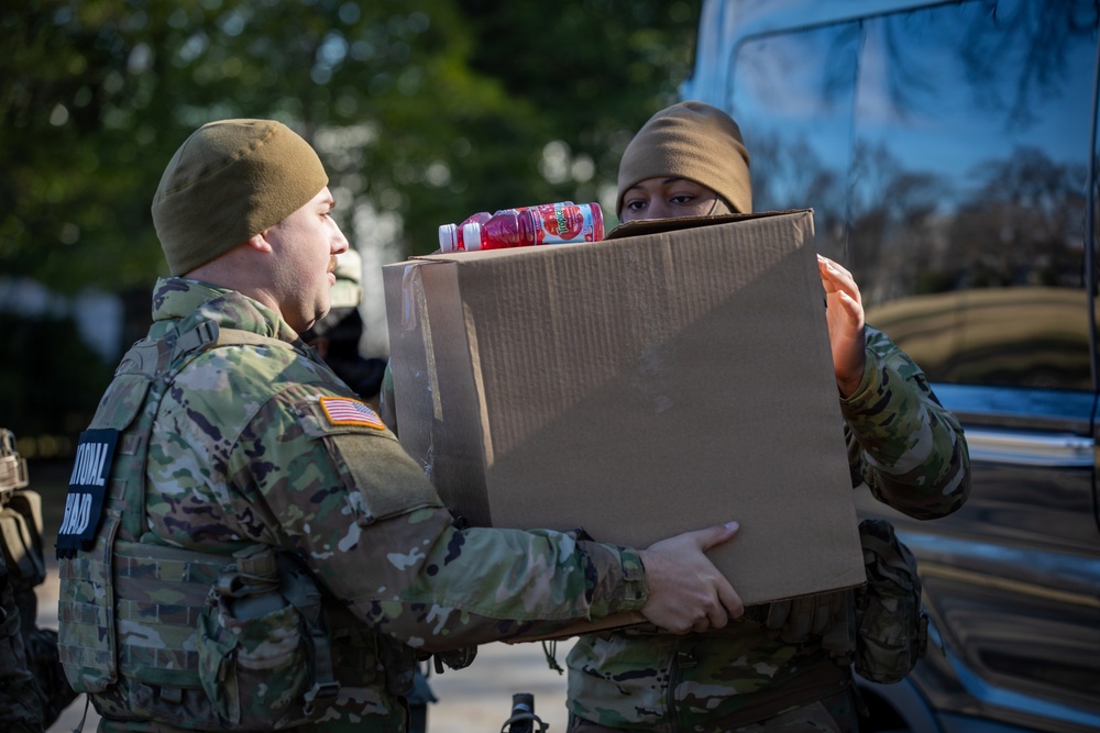 Mississippi National Guard service members receive food while on patrol in Washington, D.C.