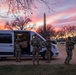 Joint Task Force Magnolia Soldiers receive food while on patrol on the National Mall