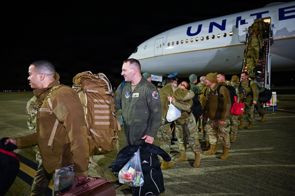 177th Fighter Wing unit members return to base after a more than three month deployment to Japan