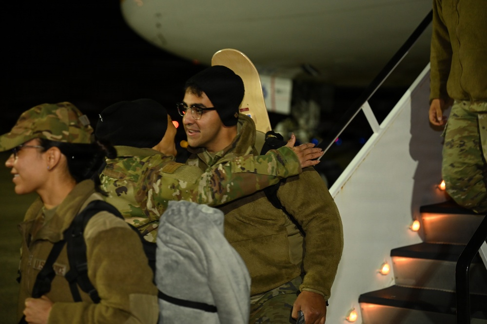 177th Fighter Wing unit members return to base after a more than three month deployment to Japan