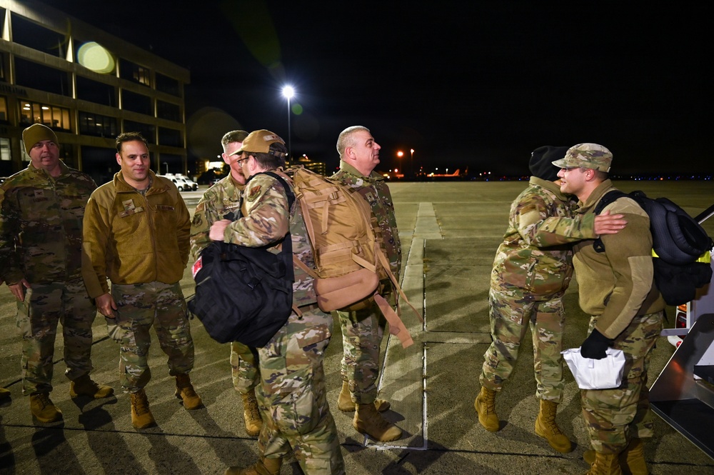 177th Fighter Wing unit members return to base after a more than three month deployment to Japan