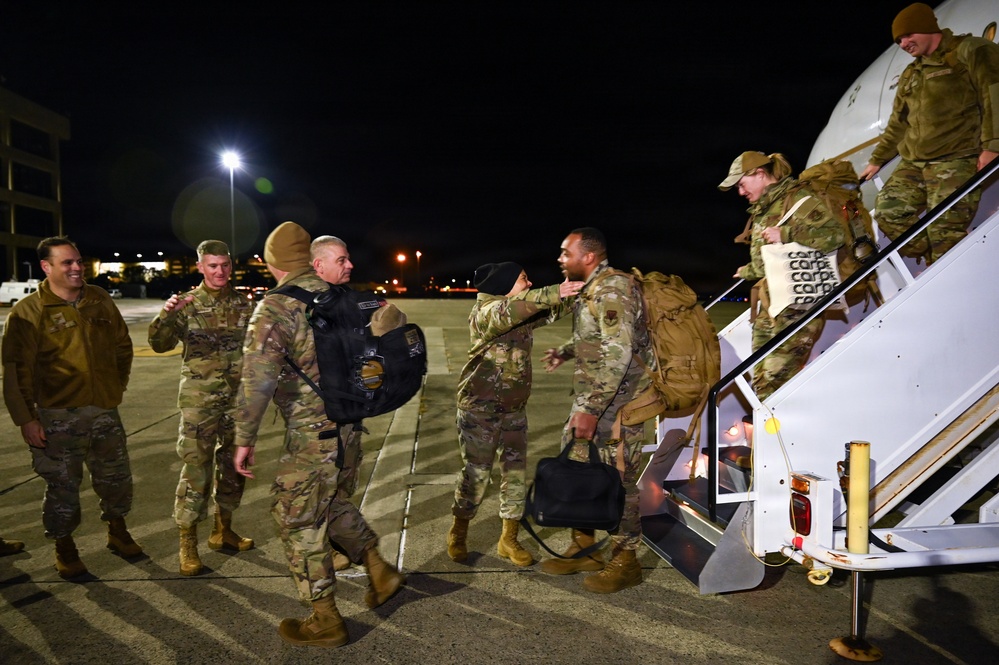 177th Fighter Wing unit members return to base after a more than three month deployment to Japan