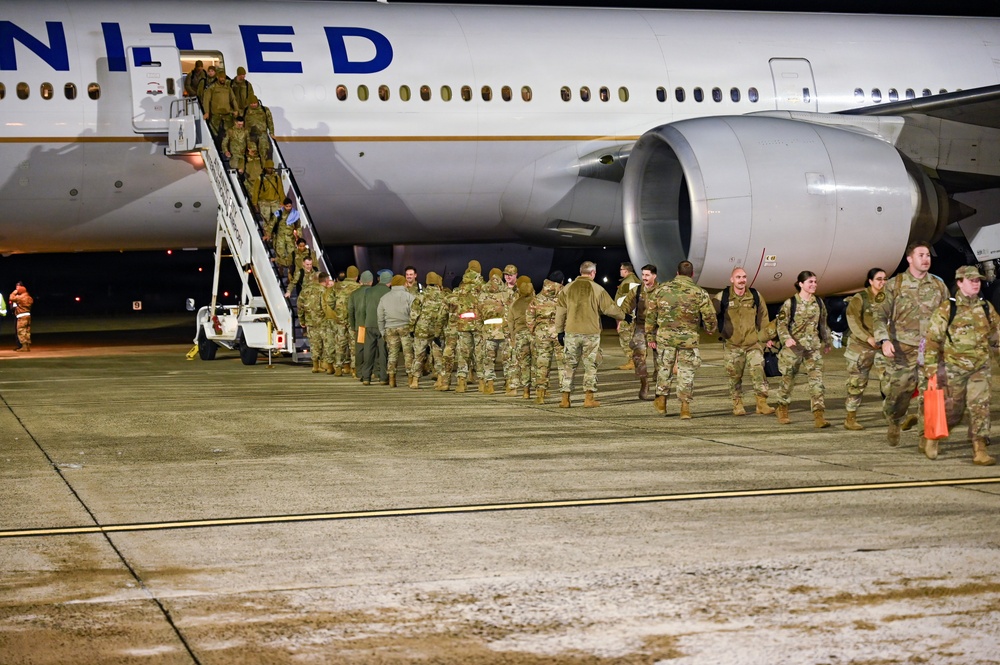 177th Fighter Wing unit members return to base after a more than three month deployment to Japan