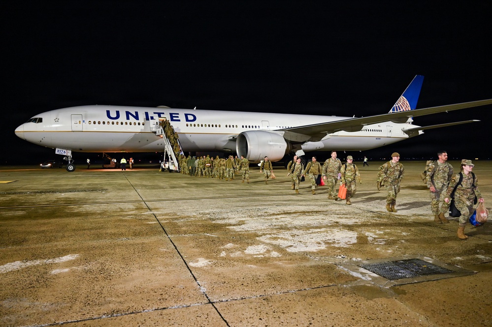 177th Fighter Wing unit members return to base after a more than three month deployment to Japan